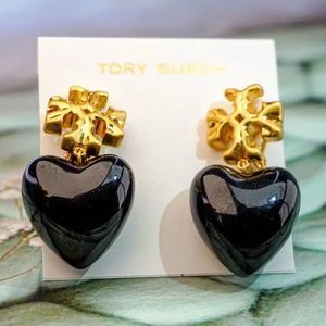 NWOT Tory Burch Gold Roxanne White Enamel Heart Clip-On Drop Earring’s